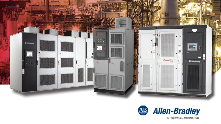 Three tall industrial metal cabinets with multiple doors house PowerFlex medium voltage variable frequency drives