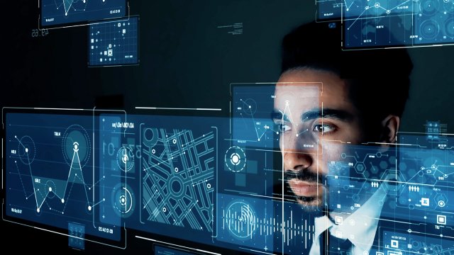 Asian businessman watching hologram screens. GUI (Graphical User Interface).
