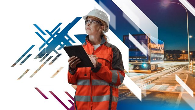 Woman in orange reflect jacket holding ipad and Michelin background